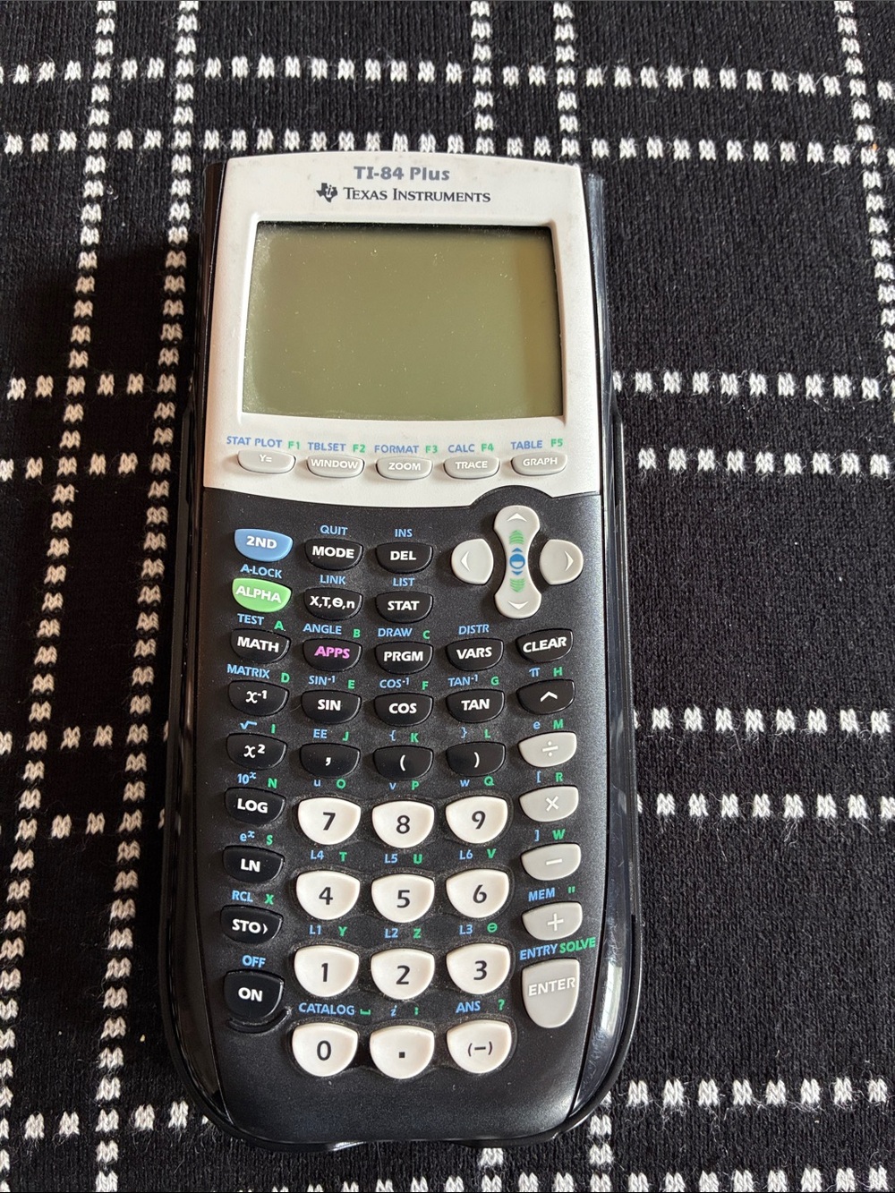 Texas Instruments TI-84 Plus Calculator in Black and White